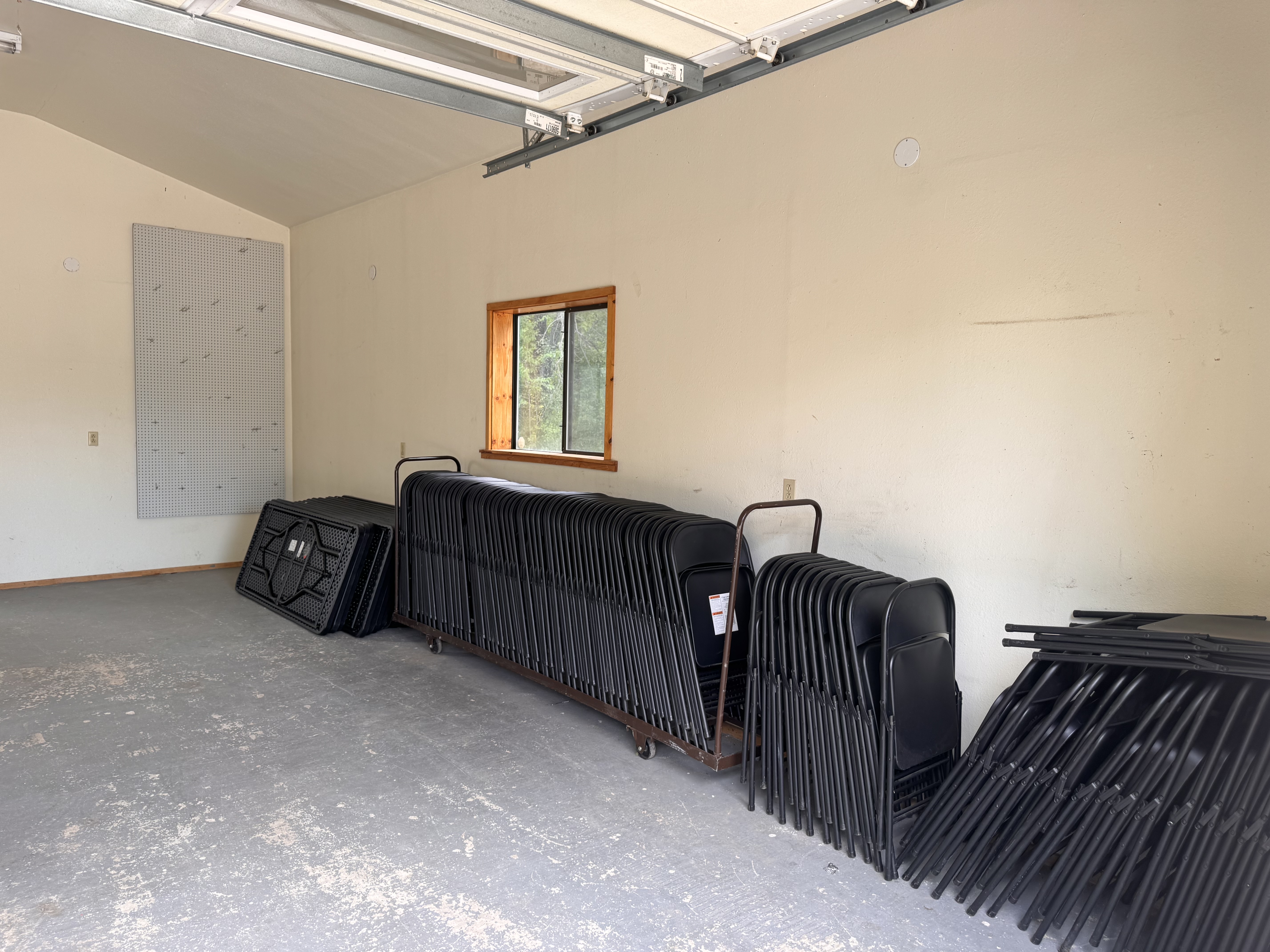 Warehouse interior with folding tables and chairs